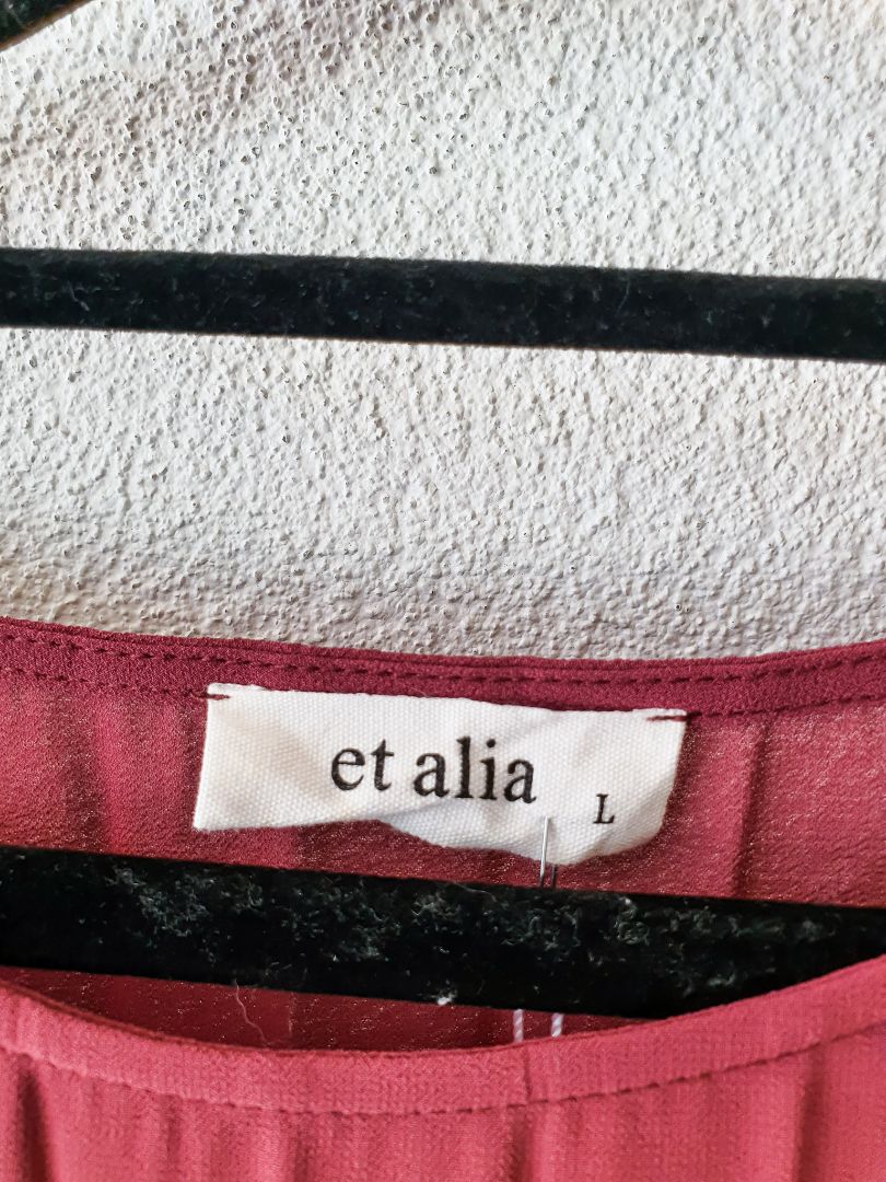 et alia Top L